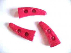 Pinkkleurige kunststof knebelknoop.40 x 15 mm.