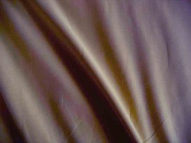 Iets dikkere kwaliteit bruine tricot. Ook heel geschikt voor jurkjes en rokjes. 70%pe/27%visc./3%sp. 1.50 mtr.br.