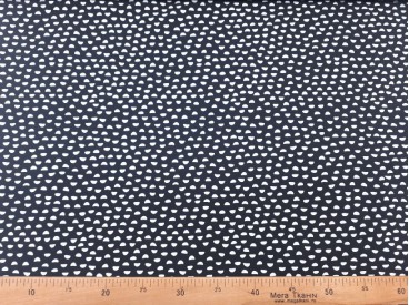 Een zwarte poplin katoen met witte kleine halve cirkels 100% katoen 1,40 mtr. breed