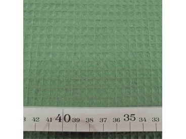 Legergroen grof wafeldoek. Het blokje is ongeveer 7 x 7 mm.  100% katoen  1.47 mtr. breed  230 gr./M2