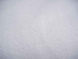Een dikke kwaliteit witte flanel 100% katoen.  200 gram p/m²  2.40 mtr.br.