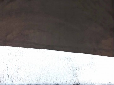 Teddy stof. Suede Teddy.  Bruin met een witte teddy binnenkant.  Rafelt niet. 100% PE 1.50 mtr. br. 400 gr/m2