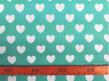 Canvas stof Mintgroen met witte hartjes