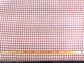 Een met rode boerenbont ruit bedrukte canvas, die iets wat stug aanvoelt.  Het ruitje is 7 x 7 mm. 100% katoen 1.50 mtr. br.