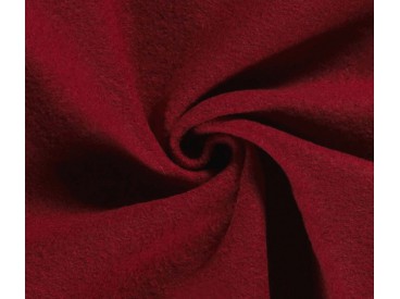 Mooie zware kwaliteit voorgekookte donkerrode bouclé wolvilt.  Rafelt niet.  100% wol  1.45 mtr.br.  410gr/m2