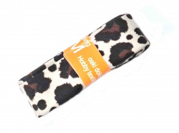Biaisband met koeienprint in een bundel van 2 meter lang.  Bruin/zwart/wit  2 cm breed  100 % katoen