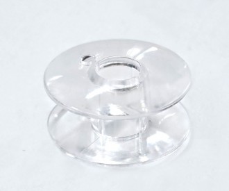 Universeel naaimachine spoeltje.  Afmetingen: 20,4 x 6,2 x 11,5mm  Geschikt voor o.a. Brother, Singer, Elna.  Materiaal: plastic