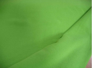 Lime kleurige joggingstof. Deze sweatstof is ook een heel geschikte stof voor huispakken.  80%co/20%pe  1.50 mtr.br.  245 gram/m