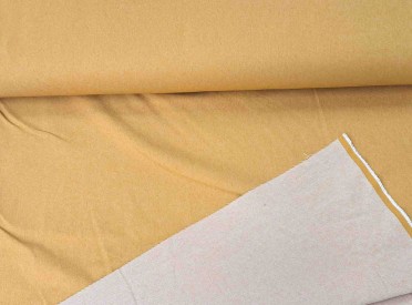 Oker kleurige stretch jeans.  48% katoen, 48% polyester,  4% elastan  1,40 mtr breed  280 gram p/m2