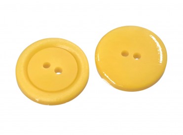 Kunststof knoop 2 gaats  Eigeel  Doorsnee ongeveer 20 mm