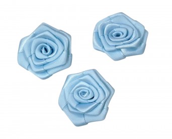Corsage. Een lichtblauwe opnaaibare roos applicatie  Doorsnee ongeveer 30 mm  Deze roosapplicaties worden per stuk verkocht