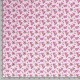 Een oudroze poplin/katoen met rood/roze roosjes. 100% Katoen 1.45 mtr. br. 110 gram p/m2