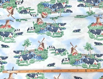 Delfts blauwe stof, met koeien en molens.  100% katoen  1.50 mtr.br.  123 gr/m²