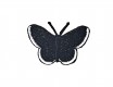 Vlinder applicatie,opstrijkbaar.  Zwart met wit randje  Ongeveer 3,5 x 2,5 cm