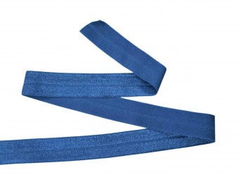 Elastisch vouwtres biaisband.  Jeansblauw.  20 mm breed.  Elastisch biaisband wordt gebruikt om rekbare stoffen af te werken.