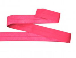 Elastisch vouwtres biaisband. Zuurstok roze.  20 mm breed.  Elastisch biaisband wordt gebruikt om rekbare stoffen af te werken.