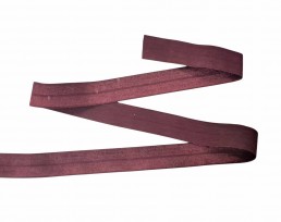 Elastisch vouwtres biaisband.  Bordeaux.  20 mm breed  Elastisch biaisband wordt gebruikt om rekbare stoffen af te werken.