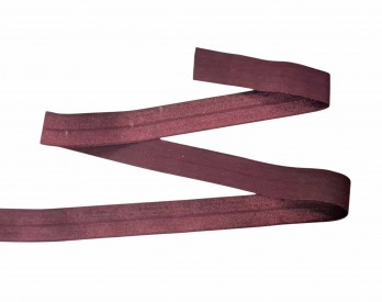 Elastisch vouwtres biaisband.  Bordeaux.  20 mm breed  Elastisch biaisband wordt gebruikt om rekbare stoffen af te werken.