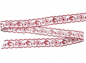 Wit katoen kant van 25 mm breed met een rood geborduurde bloem  100% katoen