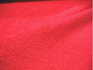 Badstof per meter € 9,95. Mooie kwaliteit helderrode badstof. Dubbel gelust. 90% katoen/10%PL 1.42 mtr.br.