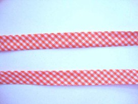 Oranje geblokt biaisband. 100% katoen 2 cm. breed