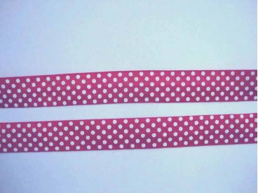 Fuchsia kleurig elastisch biaisband met witte stip. 2 cm. breed 