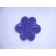 Een opnaaibare kobaltkleurige bloemapplicatie met een doorsnee van 50 mm  Prijs per stuk.