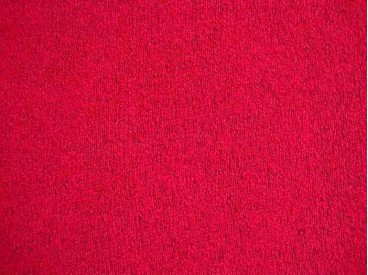 Een soepelvallende gebreide rode tricot. Voelt aan als katoen.  100% polyester  1.45 mtr. br.