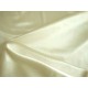 Mooie kwaliteit off-white/creme kleurige stretch satijn.  96%pl./3%sp.1.40 mtr. br.  100gr./m2