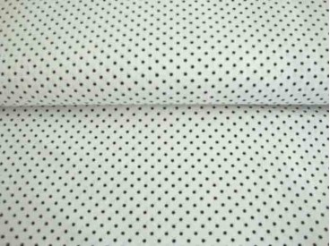 Een witte katoen met een mini zwarte stip. 100% katoen 1.40 mtr.br. 