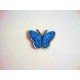 Een opstrijkbare vlinder applicatie van 3 x 2.5 cm. Aqua glitter