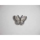 Een opstrijkbare vlinder applicatie van 3 x 2.5 cm. Lichtgrijs glitter