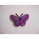 Een opstrijkbare vlinder applicatie van 5 x 3.5 cm. Paars glitter