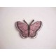 Een opstrijkbare vlinder applicatie van 5 x 3.5 cm. Roze glitter