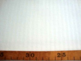 Zware kwaliteit offwhite stretch katoen met een ingeweven mini streepje. 62%katoen/36% poly./ 2% ly  1.60 mtr.  215 gram p/m²