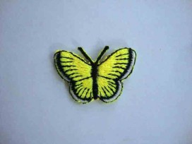 Een opstrijkbare vlinder applicatie van 3 x 2.5 cm. Neon geel
