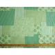 Een limegroene patchwork print. 100% katoen 1.50 mtr. br.