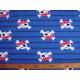 Tricot stof. Een blauw bedrukte breedtestreep met piraatjes. 95%co/5%el. 1.50 mtr.br.