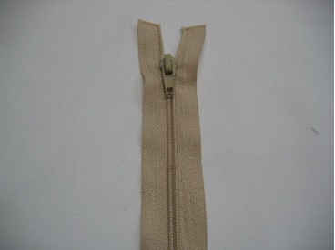 Zand kleurige deelbare fijne rits. 50 cm. lang 