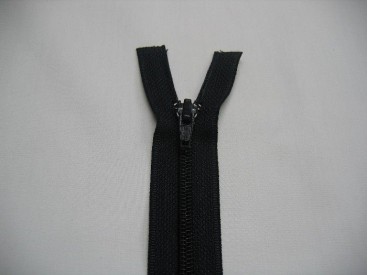 Donkerblauwe deelbare fijne rits. 55 cm. lang.