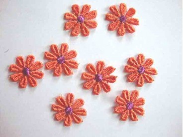 Bloemapplicatie opnaaibaar oranje-paars