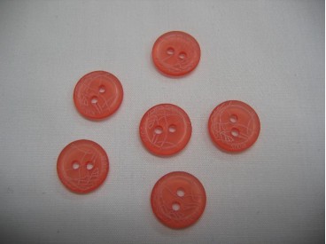 Coralkleurige knoop met krinkel 12 mm. 