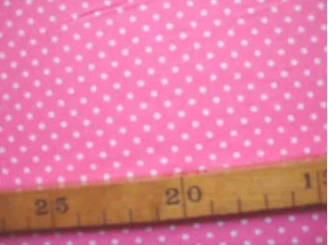 Roze soepelvallende babyrib corduroy met kleine witte stipjes . 100% katoen 1.45 meter. breed 145 gr/m2 21 Wales