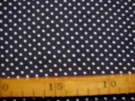 Donkergrijze soepelvallende babyrib corduroy met kleine witte stipjes . 100% katoen 1.45 meter. breed 145 gr/m2 21 Wales