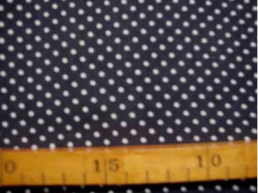 Donkergrijze soepelvallende babyrib corduroy met kleine witte stipjes . 100% katoen 1.45 meter. breed 145 gr/m2 21 Wales