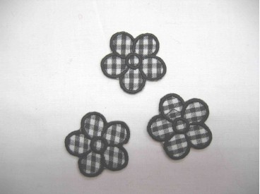 Zwarte boerenbont bloem applicatie