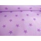 Three yarn fleece. Pastel lila gemeleerde joggingstof met grote Ster. Doorsnee 3 cm.  44% katoen/56% polyester 1.45 mtr. breed. 
